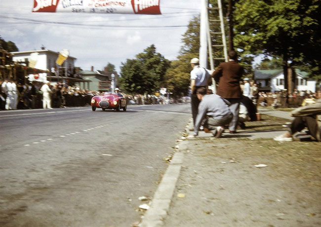 September 1952, Watkins Glen, NY USA - Bill Spear crossing the finish line in first place winning the Queen Catherine Cup race for sub 1500cc displacement